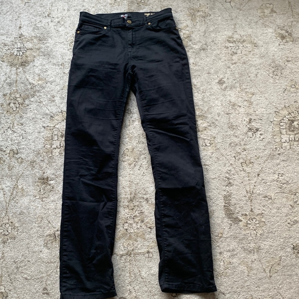 Black skinny jeans with flair at the bottom